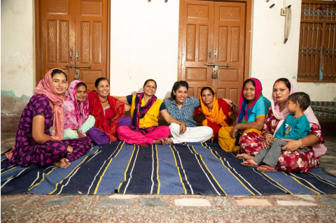 Ajaita Shah poses with women in India