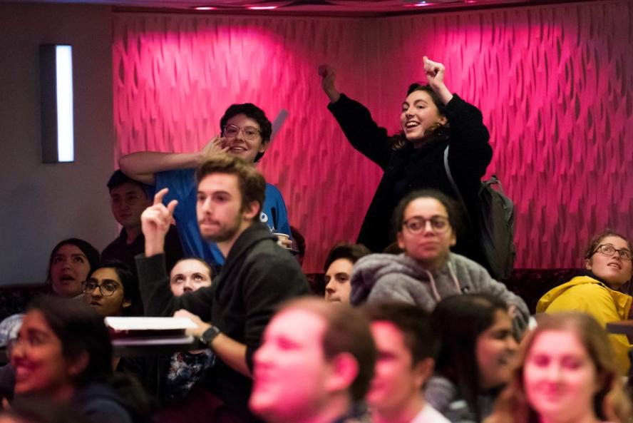 Tufts students cheer during JumboVote 2018 election night watch party