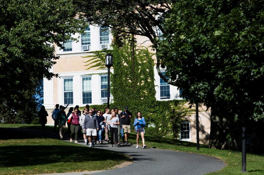 Students walking through the Tufts University campus