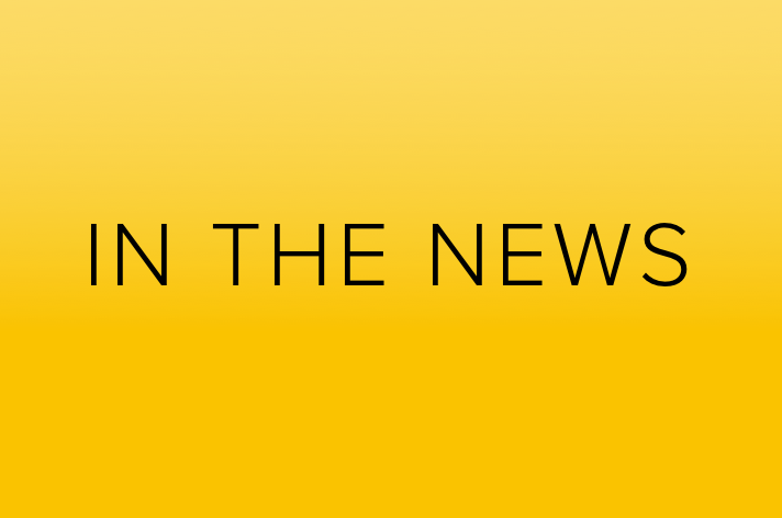 yellow background with the words "IN THE NEWS"