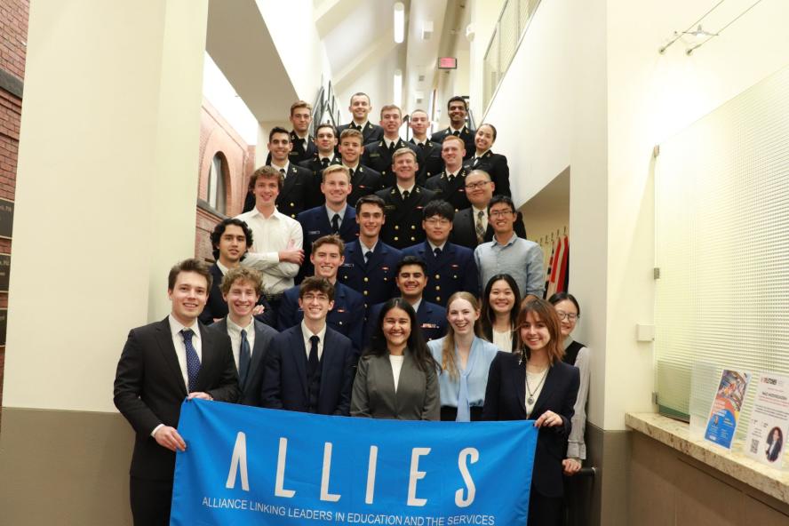Students pose with ALLIES Banner
