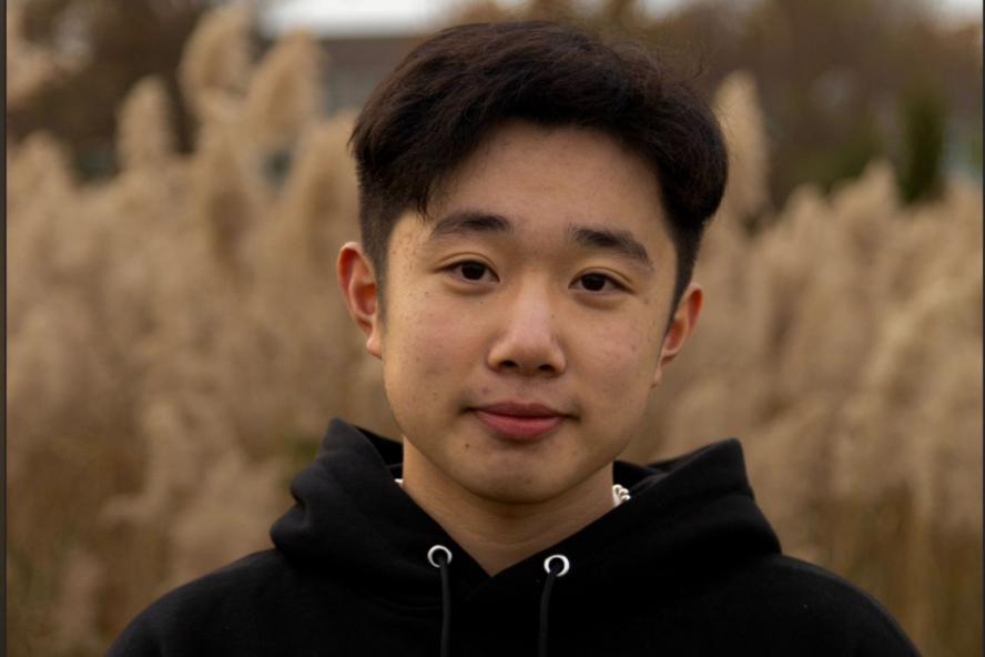 Image of Nelson Chen, a civic semester student in front of a field