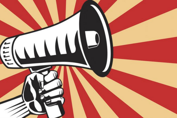 Hand holding a bullhorn against a red and gold striped background.