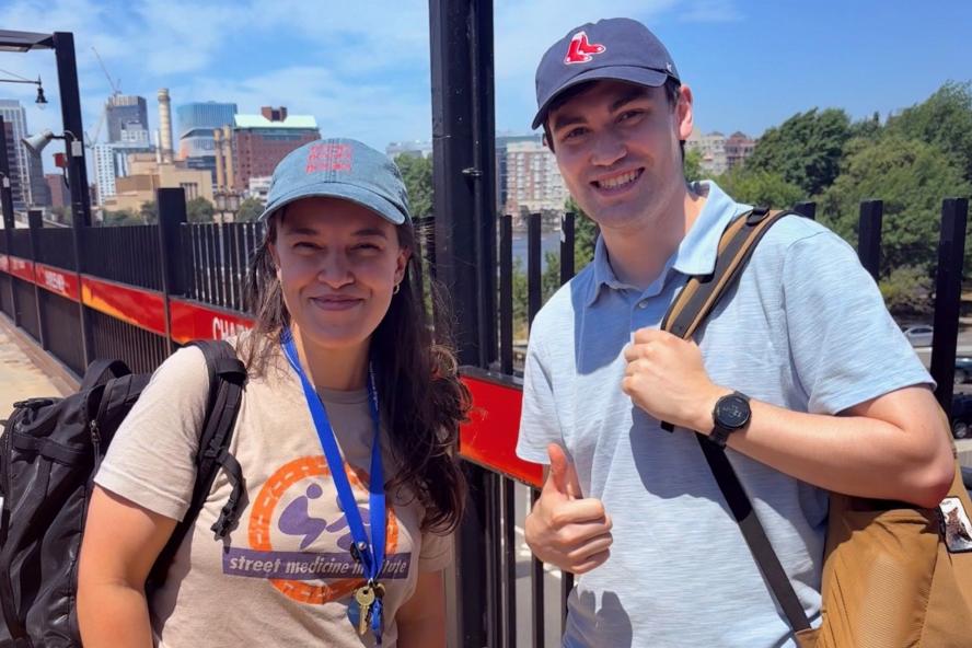 Tisch Summer Fellow and supervisor pose outside in Boston while working for Boston Healthcare for the Homeless street team