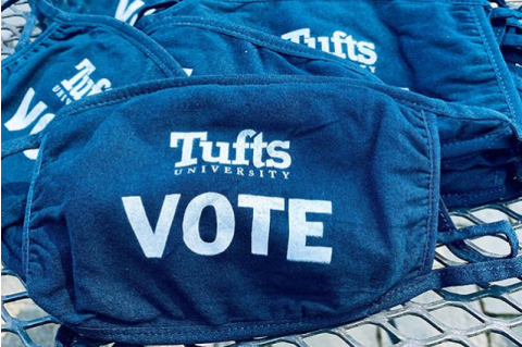 blue bags with the words "Tufts University Vote"