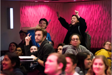 Tufts students cheer during JumboVote 2018 election night watch party