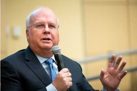 Karl Rove, former Deputy Chief of Staff and Senior Advisor to President, speaking into a microphone