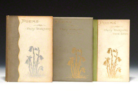three first editions of Emily Dickinson's poetry