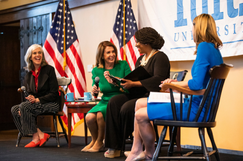 Katherine Clark, Nancy Pelosi, Ayanna Pressley, and Lori Trahan speaking at Tufts