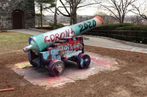 cannon spray-painted with the words "Corona 2020" and "Class of 2020"