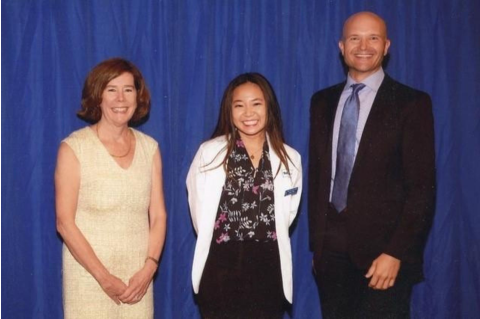 Left to Right: Dean Helen Boucher, Melissa Calica, M25, and her faculty coach James Bartz, a physician at Newton-Wellesley Hospital