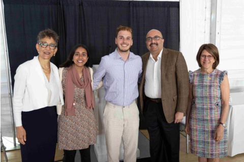 Michael Zarra poses with nominators from the Med School as well as Dean Dayna Cunningham and President Kumar at the 2025 Presidential Awards Ceremony