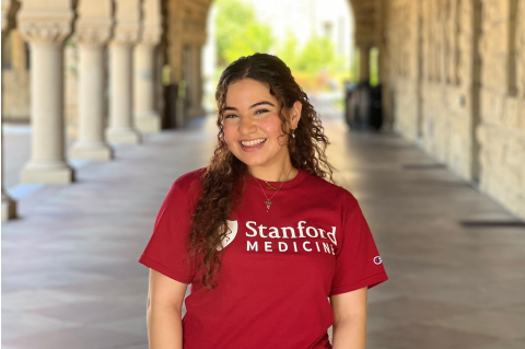 Siwaar Abouhala headshot at Stanford University wearing a Stanford Medicine shirt