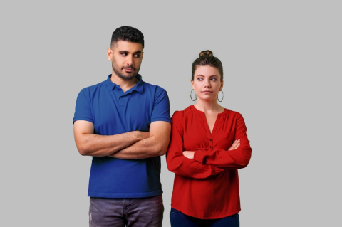 A man in blue and a woman in red